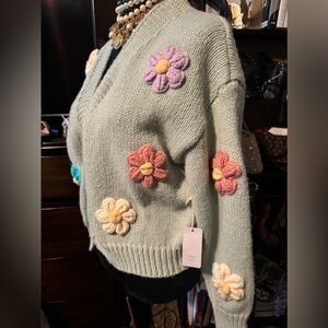 Beautiful pop out flower sweater